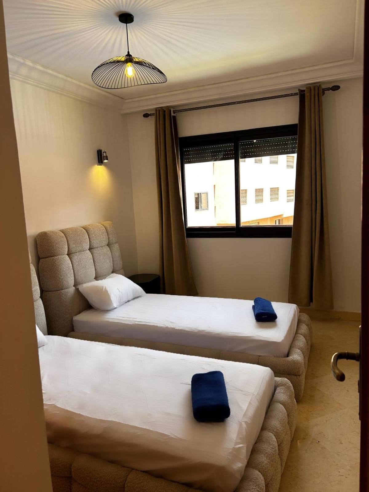 Charmant Appartement A Gueliz マラケシュ エクステリア 写真